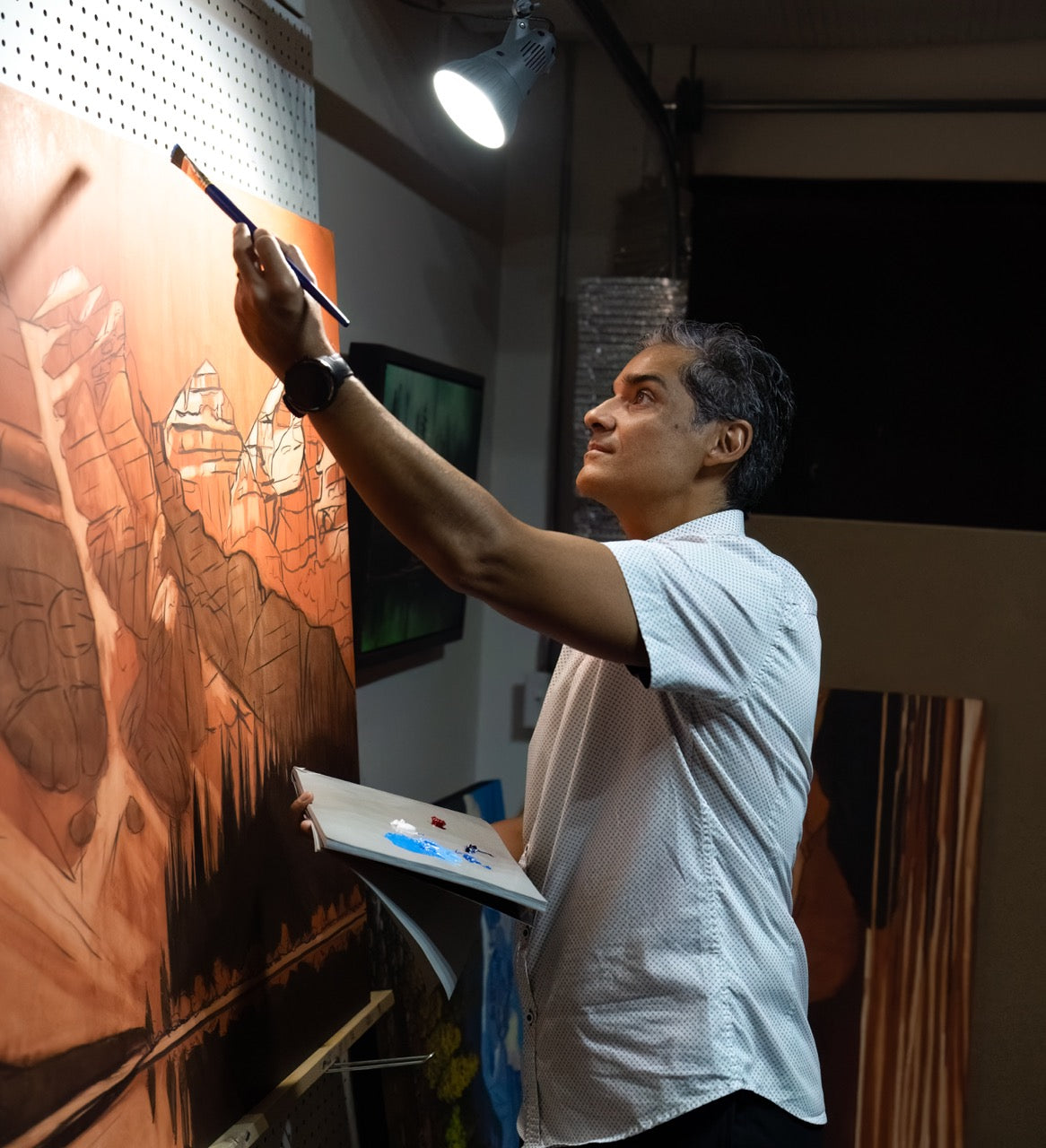 Artist Marcos Molina in his Banff studio